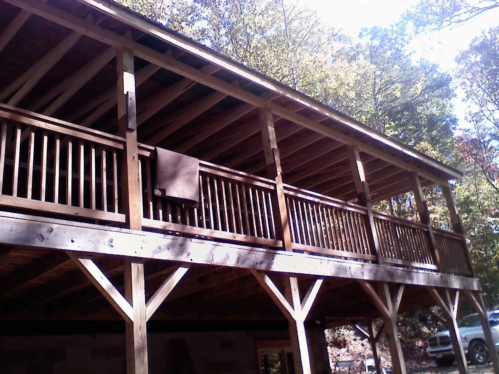 Timber framing under a new elevated porch and deck — Roof Leak Repair in Spray by Roofing Brothers